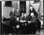 [Governor Young signing a bill]