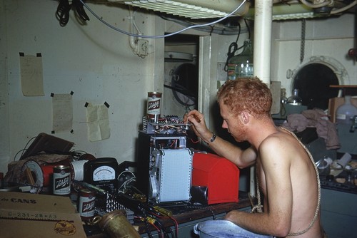 Oceanographer Alan Churchill Jones shown here uses a strip recorder during the Capricorn Expedition (1952-1953). A chart recorder is an instrument used to record various process and electrical signals. This expedition mapped seamounts and guyots and other features of the Pacific seafloor. Scientists studied the 35,400 foot deep Tonga Trench, the second deepest place in the ocean, and measured heat flow on the East Pacific Rise. 1952