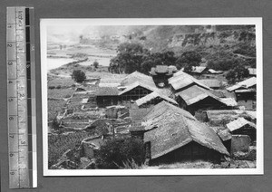 Roofs of homes in a village, Tibet, China, ca.1941