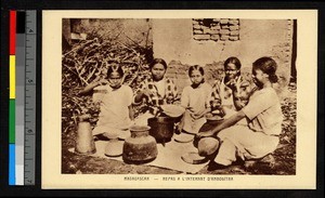 Women sharing a meal outdoors, Madagascar, ca.1920-1940
