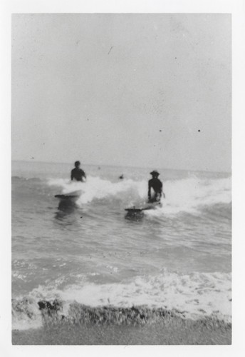 Unidentified surfer and Harry Mayo at Cowell Beach