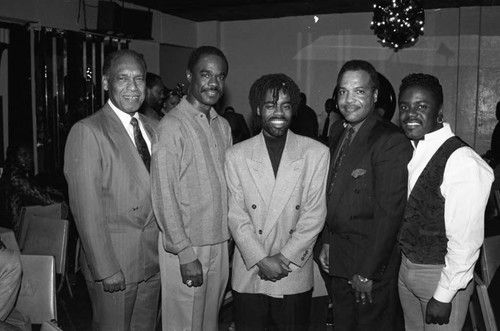Glynn Turman posing with attendees of the National Newspapers Publishers Association convention, Los Angeles, 1993