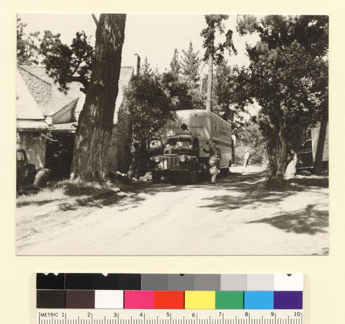 [Men packing truck. Hagemeyer residence, Carmel.] [photographic print]