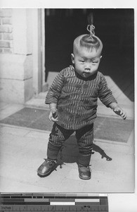 A small boy at Fushun, China, 1938