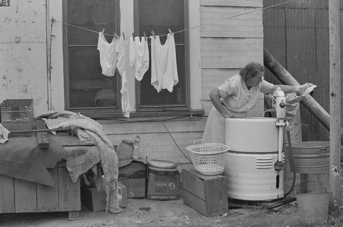 Woman doing the laundry, from Walnut Grove: Portrait of A Town