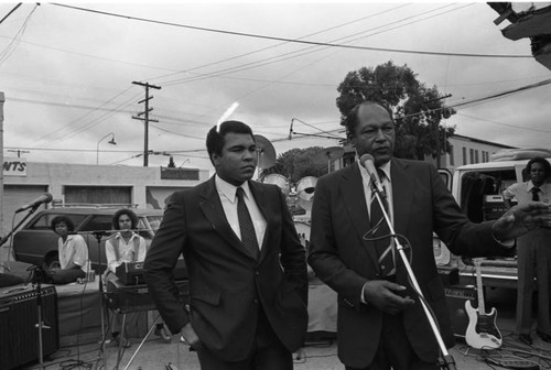 Muhammad Ali standing with Tom Bradley during a mayoral campaign, Los Angeles, 1981