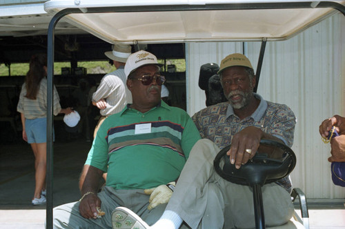 Bill Russell sitting in a golf cart during the Jackie Robinson Foundation Gold Classic, Los Angeles, 1994