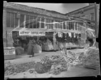 Grocery store with brick rubble on street in front after the Long Beach earthquake, Southern California, 1933
