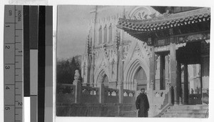 European missioner standing near Xishiku Cathedral, Peking, China, ca. 1910-1930