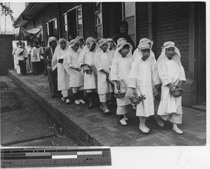 Flower girls in Corpus Christi procession at Fushun, China, 1940