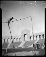 Lee Barnes pole vaulting at the Los Angeles Memorial Coliseum, 1924