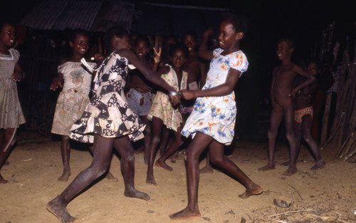Girls boxing outdoors, San Basilio de Palenque, 1976