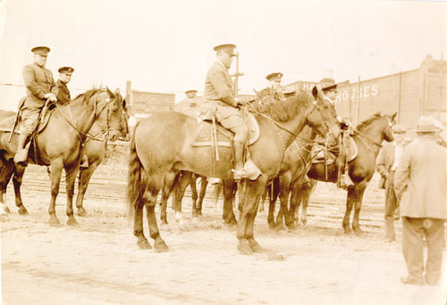 [Police officers on horses during strike]