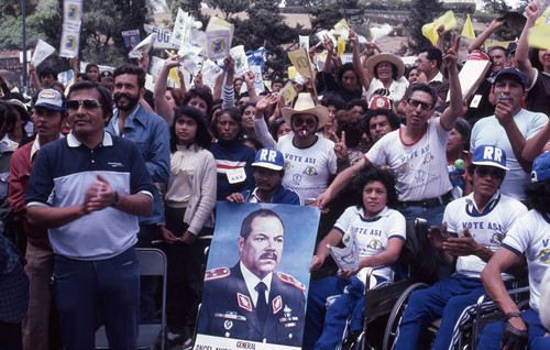 A crowd of people holding posters and banners in support of presidential candidate Ángel Aníbal Guevara , Guatemala City, 1982