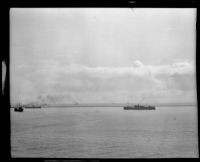 US Navy battleships head out to sea from the Port of Los Angeles, San Pedro