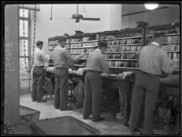 Beverly Hills Post Office, interior with men sorting mail, Beverly Hills, 1934