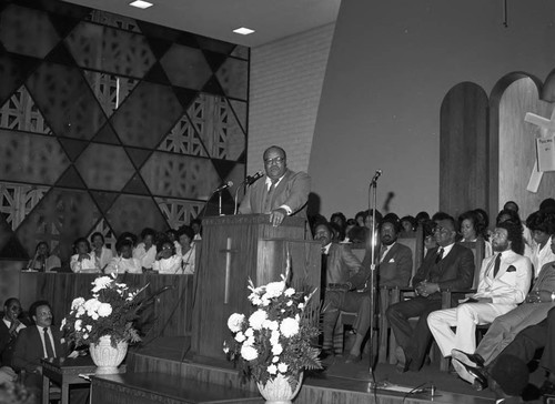 Twenty-four Hour Gospel Marathon participants listening to a sermon, Los Angeles, 1983