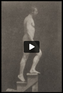 Nude man ascending stairs