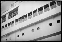 Passengers looking out the windows of the S.S. Mariposa, Los Angeles