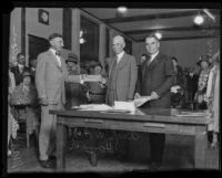 Sam L. Kreider and Marshall Stimson present award to W. H. Housh, Los Angeles, 1925