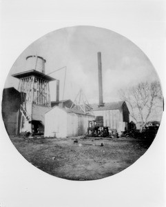 Exterior view of the first electric power house in Los Angeles, possibly on Maple Avenue, ca.1890