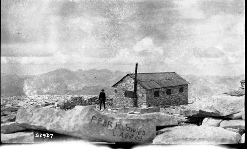 Backcountry cabins and Structures, shelter on top of Mt. Whitney erected in 1909. Markings on boulders were effaced in September 1929