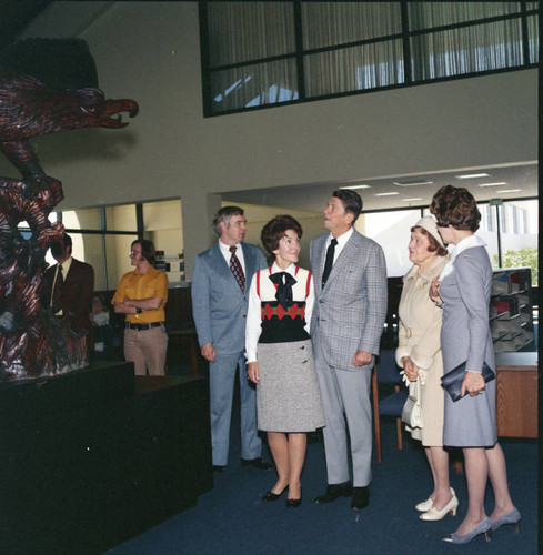 Ronald Reagan and group in Payson Library following Pepperdine University tree planting dedication, 1973