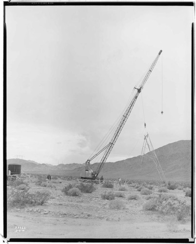 Boulder-Chino Transmission Line (2nd) - First lift in errecting tower with P & H Crane