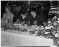 Secretary of Labor Frances Perkins and Mae Stoneman at banquet of the California Federation of Democratic Women's Study Clubs, Los Angeles, 1940