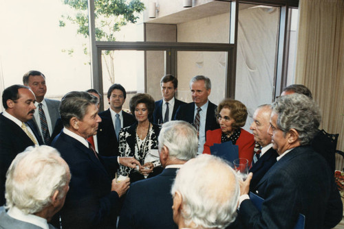 President Ronald Reagan speaks to small group