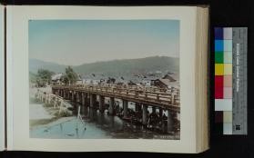 Photograph of people under Sanjio Bridge in Kyoto