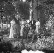Exterior view of a family in front of a house in Fair Oaks