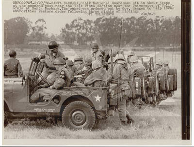 Soldiers Riding 175 mm Gun