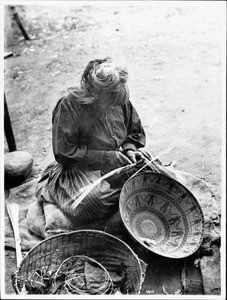 Yokut Indian woman basket maker, Tule River Reservation near Porterville, California, ca.1900