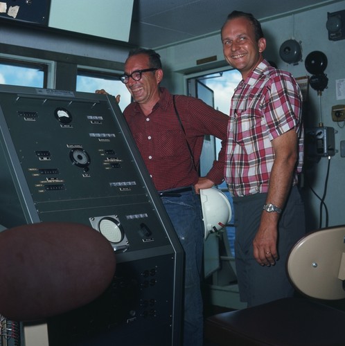 William A. Nierenberg (left) director of Scripps Institution of Oceanography and vice chancellor of marine sciences at UCSD, and Melvin N.A. Peterson (right) professor of oceanography and who also directed the Deep Sea Drilling Project from Scripps Institution of Oceanography from 1971 to 1986, on the bridge of research ship D/V Glomar Challenger during the international deep sea drilling project. Circa 1968