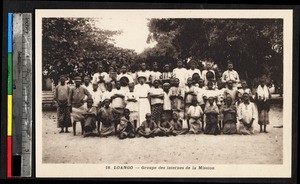 Interns posed outside with clergy, Loango, Congo, ca.1920-1940