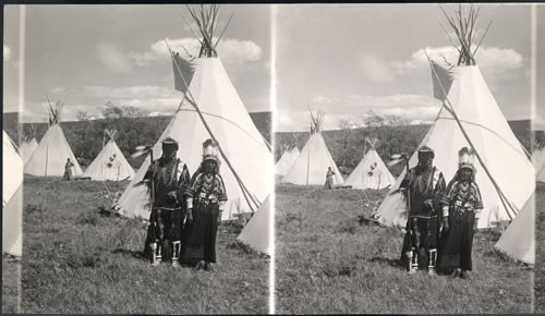 Indians (man & wife) and Teepees