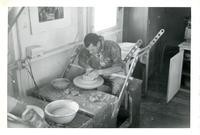 Man working at a potter's wheel