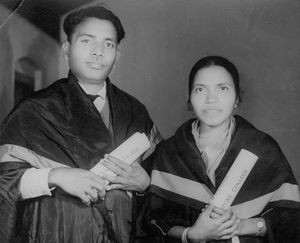 Sagenen Kisku and Porimol Kisku receiving their graduation papers after theological education a