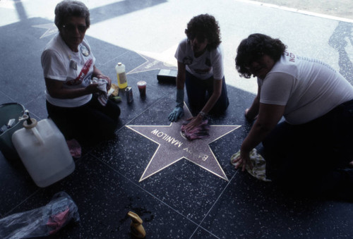 Cleaning a Walk of Fame star