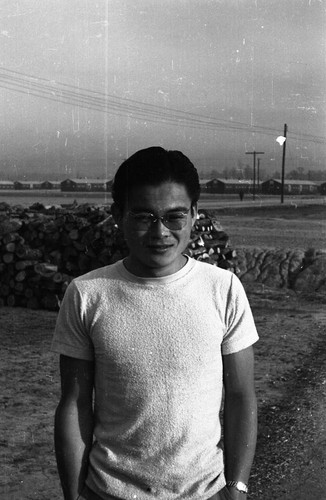 Man wearing glasses in Jerome camp