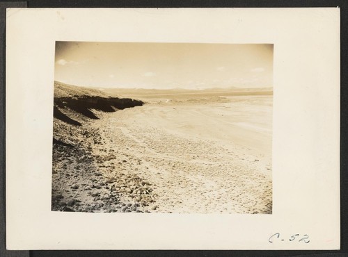 Tule Lake, Calif.--A panoramic view of the agricultural land which will be cultivated by evacuee farmers at this War Relocation Authority center. Tule Lake is shown in the background. (See also C-53, C-54, and C-55 for complete panorama.) Photographer: Albers, Clem Newell, California