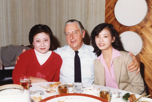 Dr. Tegner with two ladies in a Chinese restaurant (Color)
