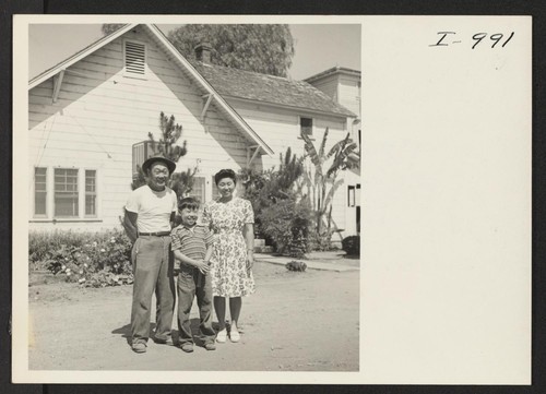 Mr. and Mrs. Kaudy Mimura and their son, Kenneth, is shown at their home located at Rt. 1, Box 43