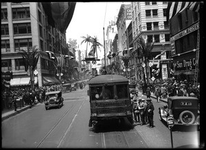 View of a Shriner's Parade on Broadway looking north from Seventh Street, ca.1925