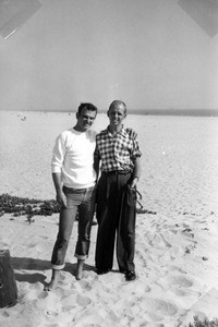 Hal Rebarich and unidentified man standing at the beach