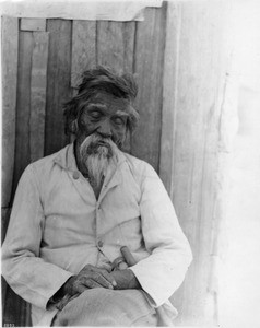 Portrait of an elderly Cahuilla Mission Indian man with his eyes closed, ca.1900