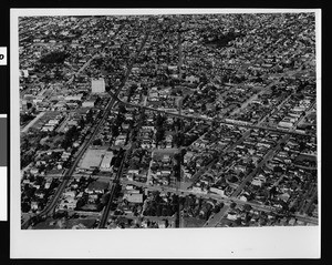 Aerial view of Los Angeles, looking north on Hoover Street from Third Street, 1939