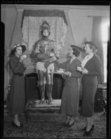 Assistance League Nine O'clock Players Peggy Duccommon, Harriet Calder, Mrs. Harry Slater and Elizabeth Finch Abrams prepare for a performance of "Snow White and the Seven Dwarfs", Los Angeles, 1936