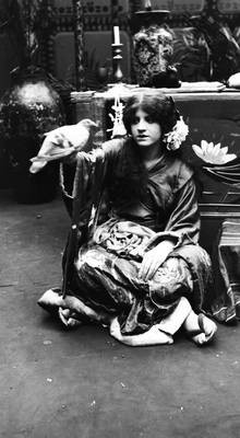 Marguerite Snow in costume with bird